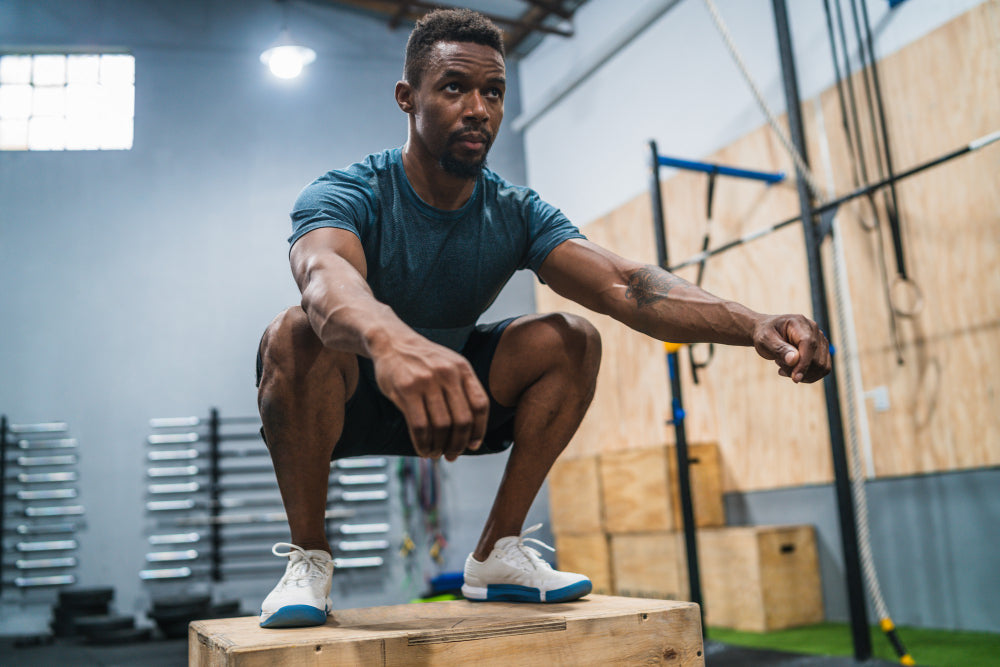 Man performing a box jump