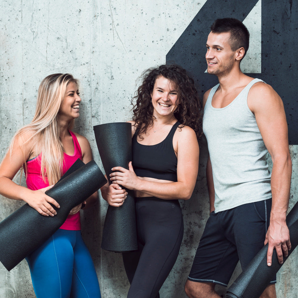 Three people holding
